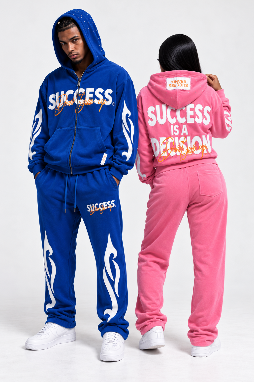Blue and pink Success Brand tracksuits worn by models